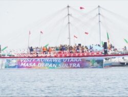 Upacara HUT Ke-16 Kabupaten Konut Digelar di Atas Air Laut