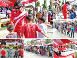 Plt Bupati Koltim Semangati Warga Sambil Menanti Finis Peserta Gerak Jalan
